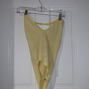 Forever 21 yellow‎ halter body suit low cut back
